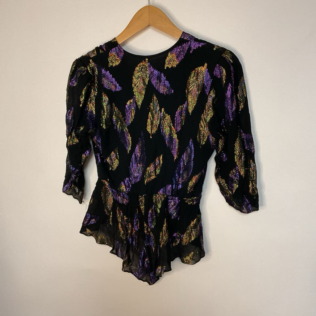 Fashion Spirit Petites - Size 9/10 - black short sleeve top with iridescent purple/green leafs